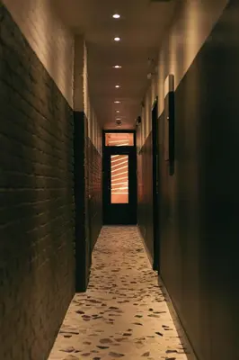 a long hallway with a door and a walk way at Ode in Toronto