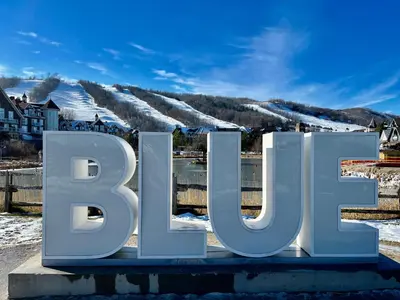 a large sign for the ski resort at Blue Mountain Studio Oasis in Blue Mountains