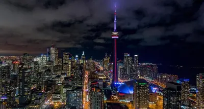 a view of the cn tower at night at Holiday Inn Toronto Downtown Centre by IHG in Toronto