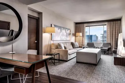 a living room with a couch and a table at The Westin Harbour Castle, Toronto in Toronto
