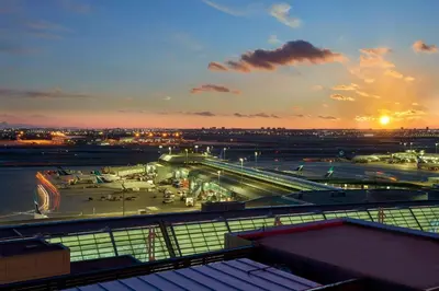 a view of a parking lot at sunset at Sheraton Gateway Hotel in Toronto International Airport in Mississauga