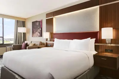 a large white bed in a hotel room at DoubleTree by Hilton Hotel Toronto Airport West in Mississauga