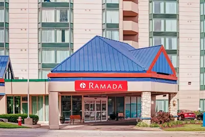 a building with a rammadi sign in front of it at Ramada by Wyndham Niagara Falls/Fallsview in Niagara Falls