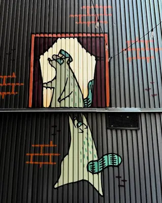 a painting of a person on the side of a building at Union Hotel in Toronto