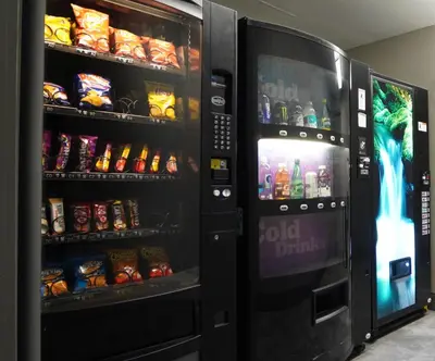 a vending machine with food and drinks in it at Days Inn by Wyndham Niagara Falls Near The Falls in Niagara Falls