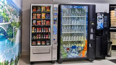 a soda vending machine in a store at Diplomat Inn in Niagara Falls