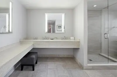 a bathroom with a sink and a shower at Sheraton Parkway Toronto North Hotel & Suites in Richmond Hill
