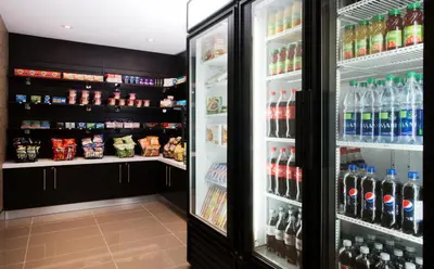 a refrigerator filled with lots of drinks at Park Inn by Radisson Toronto-Markham in Markham