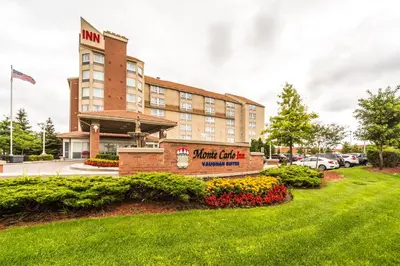 a hotel sign in front of a building at Monte Carlo Inn Vaughan Suites in Vaughan