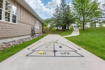 a frisbee golf game in front of a building at Carriage Ridge Resort, an Ascend Collection Resort in Oro-Medonte