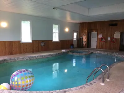 a large swimming pool with a ball in the middle at Marmora and Lake Inn and Victorian Diner in Marmora