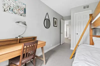 a bedroom with a desk and a bed at All Seasons Sierra Lane Retreat 88371 in Blue Mountains