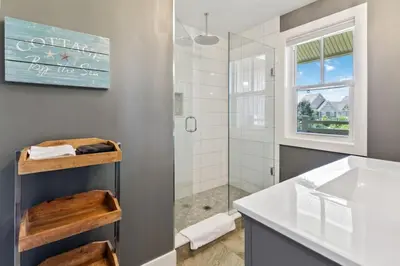 a bathroom with a sink and a shower at Rivergrass Townhouse in Blue with Pool Golf Skiing - 219 Rivergrass in Blue Mountains
