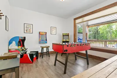 a room with a pool table and a window at Luxurious Arlberg Retreat 89883 in Blue Mountains