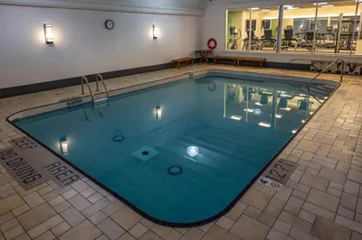 a large swimming pool in a hotel room at Holiday Inn Hotel & Suites St.Catharines-Niagara by IHG in St. Catharines