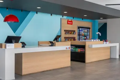 a view of a store checkout counter in a store at avid Hotel - Toronto - Vaughan Southwest by IHG in Vaughan