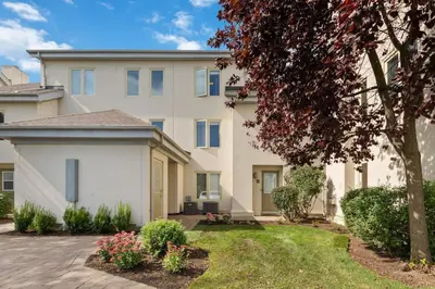 a large white house with a driveway at Luxurious Sierra Lane Escape in Blue Mountains