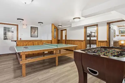 a billiard room with a ping pong table at 12 Beds Sleep 16 Chalet with HotTub, 2min to Blue in Blue Mountains