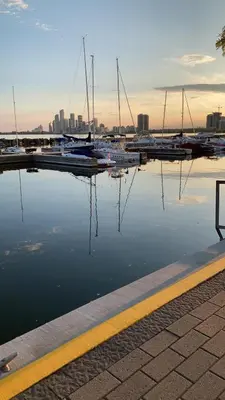 a marina with boats parked in the water at Entire Queen Loft in Toronto