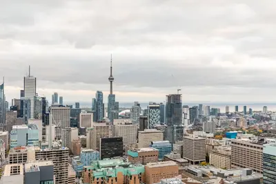 a view of auckland city skyline with the cn tower at Urban Skyline in Toronto