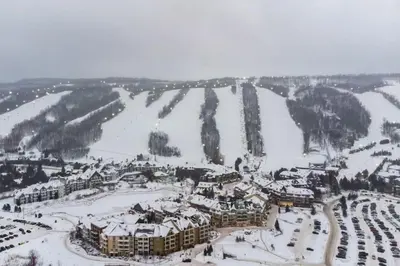 an aerial view of a ski resort in the snow at Contemporary Chalet Steps to Blue Mountain Village in Blue Mountains