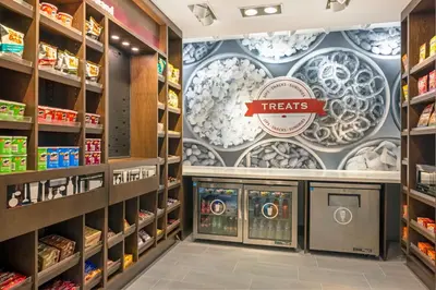 a grocery store aisle with aries sign on the wall at Hampton Inn Midland, On in Midland