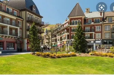 a park in front of a large building at Freshly Upgraded Cozy Loft @ North Creek Resort in Blue Mountains