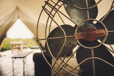 a close up of a metal object with a tent at Fronterra Wellness Farm & Camp in Hillier