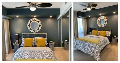 a bedroom with two beds and a mirror at Cozy Condo in Centre of Downtown Toronto in Toronto