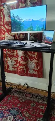 a desk with a computer and a laptop on it at Four Bedroom Rosedale Home in Toronto