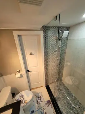 a bathroom with a shower and a toilet and a sink at Classic & Luxury Private Detached Entire Home with Free WI-FI & T.V in Brampton