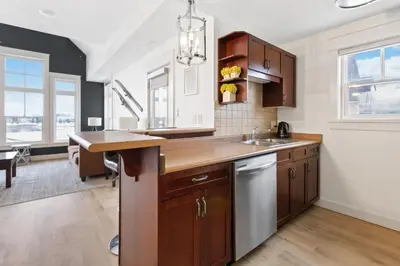 a kitchen with a sink and a counter top at Rivergrass Home with Mountain and Golf Course Views in Blue Mountains