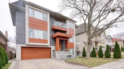 a house with a brown garage at Modern House in Toronto in Toronto