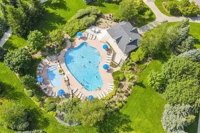 an aerial view of a swimming pool in a yard at Exceptional 3 BDRM Townhome - 4 Seasons Rental in Collingwood