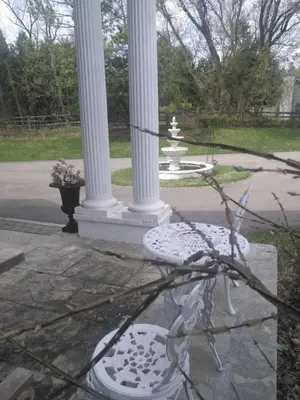 a statue of a chair in front of a fountain at Lakeview private suite-Twin or king in Tottenham