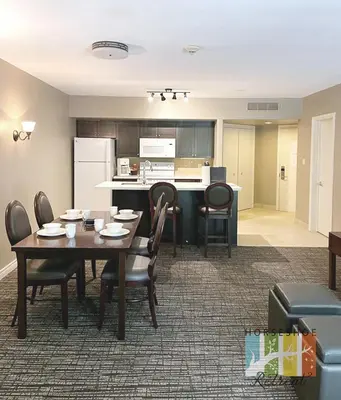 a kitchen and dining room with a table and chairs at Horseshoe Retreat in Edgar