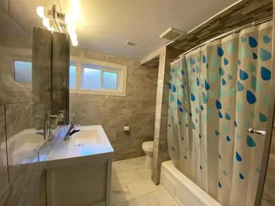 a bathroom with a sink and a shower at Yonge and Finch Subway !R Spacious & Stylish Prvt Bdr with Shared Bathroom in Toronto