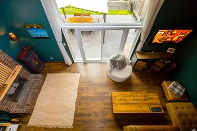 an overhead view of a living room with a large window at Cosy 3-Bedroom Home in Quiet Cul-de-Sac. in Pickering