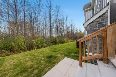 a porch of a house with a wooden deck at Jewel of Blue Mountain - Walk to Ski and Village - EV plug in Blue Mountains
