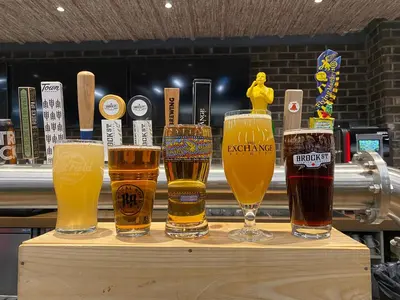 a group of four glasses of beer on a table at Pickering Casino Resort in Pickering