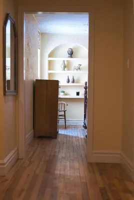 a hallway with a room with a table and shelves at The Stratford Hotel by Hoco Hotels Collection in Stratford
