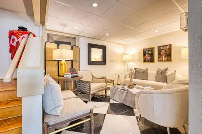 a living room with a couch and chairs at The Stratford Hotel by Hoco Hotels Collection in Stratford