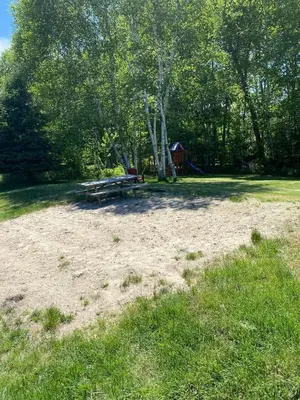 a picnic table in the middle of a park at WELCOME TO BURNT RIVER ESTATE in Kawartha Lakes