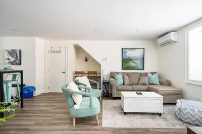 a living room with a couch and a table at 