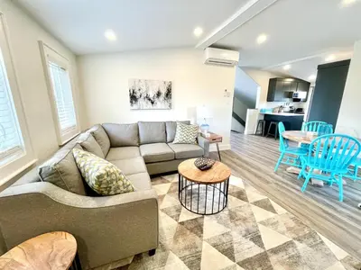 a living room with a couch and a table at 