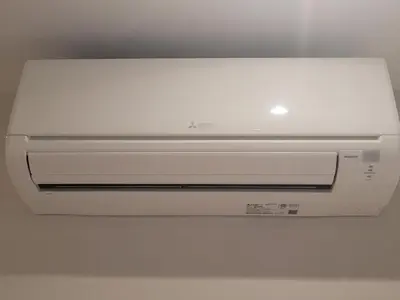 a white printer sitting on top of a wall at Private Suite in Forest Hill with full kitchen and parking in Toronto