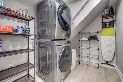 a laundry room with a washer and dryer at Vacation Suite in Pickering in Pickering