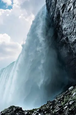a waterfall is coming out of a mountain at Guest House Room No 01 in Mississauga