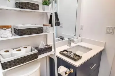 a bathroom with a sink and a toilet at PET FRIENDLY CONDOS at FRIDAY HARBOUR in Innisfil