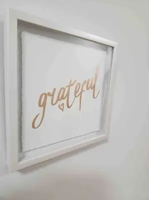 a white picture frame with the word perfect on a wall at Luxury 4-Bedrooms Home… in Brampton